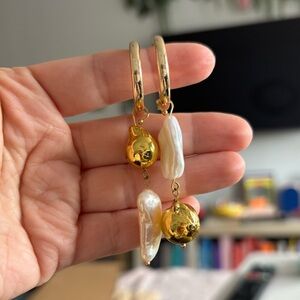 Large gold tone baroque pearl drop hoop earrings